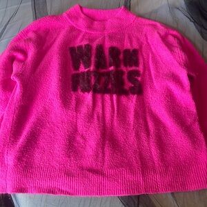 Hot pink "warm fuzzies" sweater